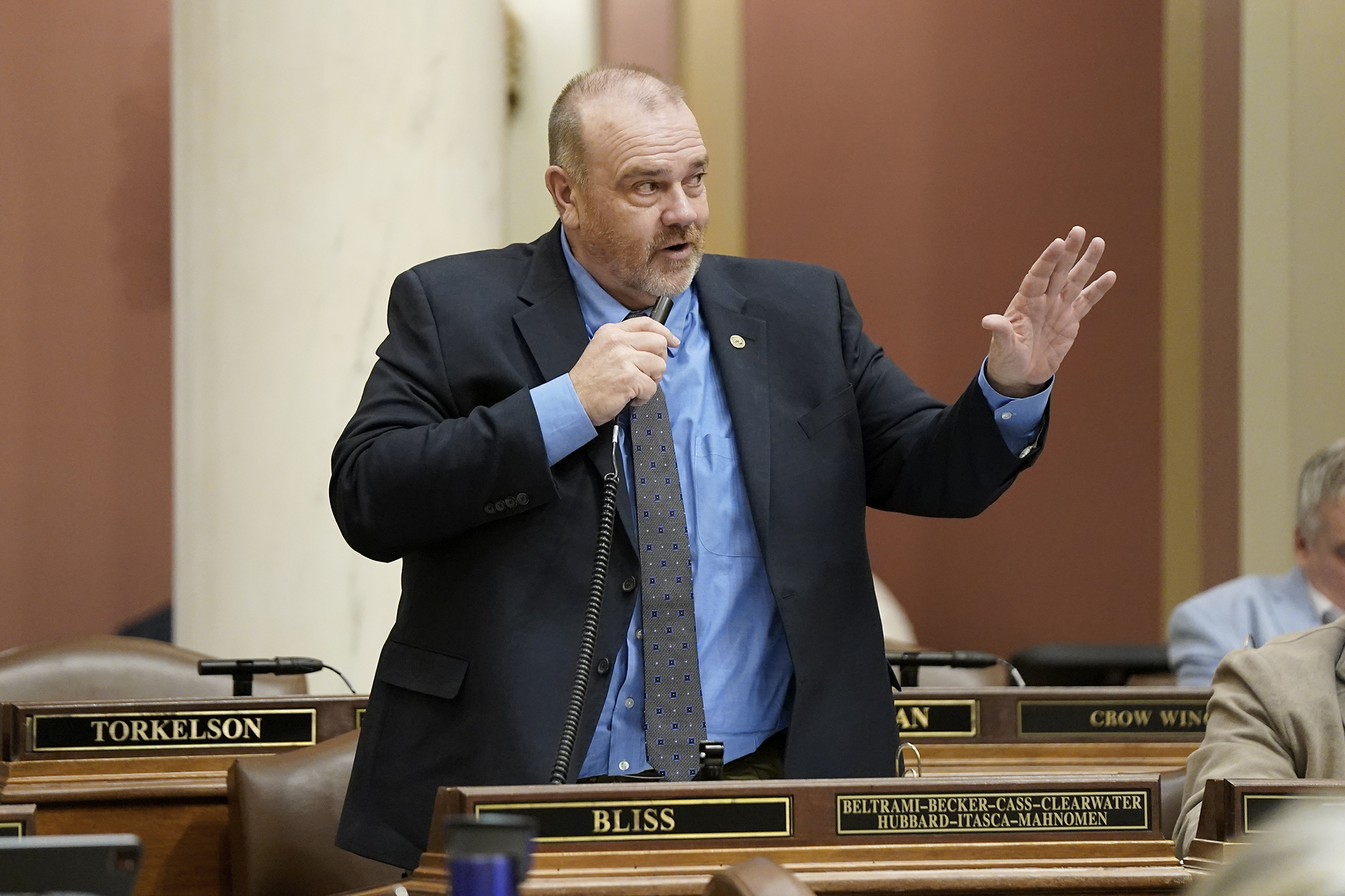Rep. Matt Bliss introduces HF13 on the House Floor March 6. The bill to eliminate the duty to retreat before using reasonable force in defense of self or others failed along party lines. (Photo by Michele Jokinen)